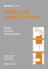 BUILDING WITH LARGE CLAY BLOCKS